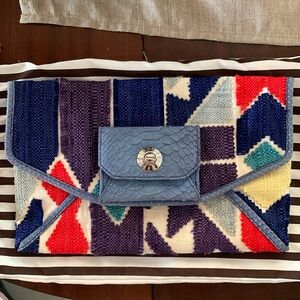 Henri Bendel Woven multi colored clutch